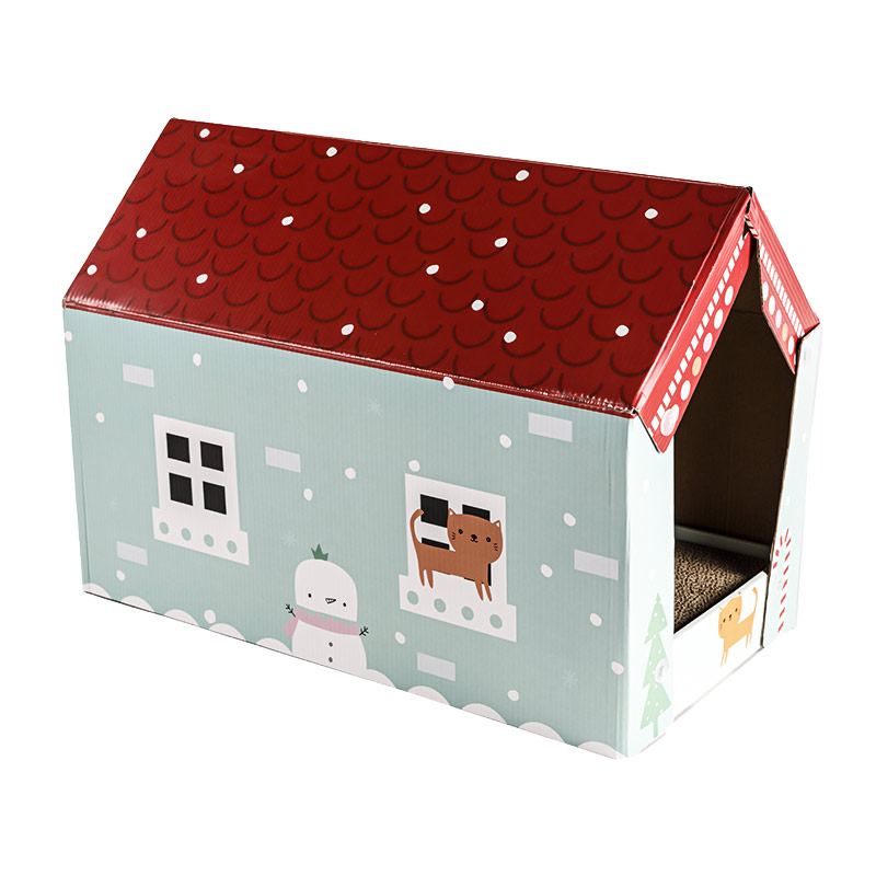 Xmas House a conçu un grattoir pour chat et un tapis de repos avec une belle couverture de maison, fabriqué en carton recyclable respectueux de l'environnement.