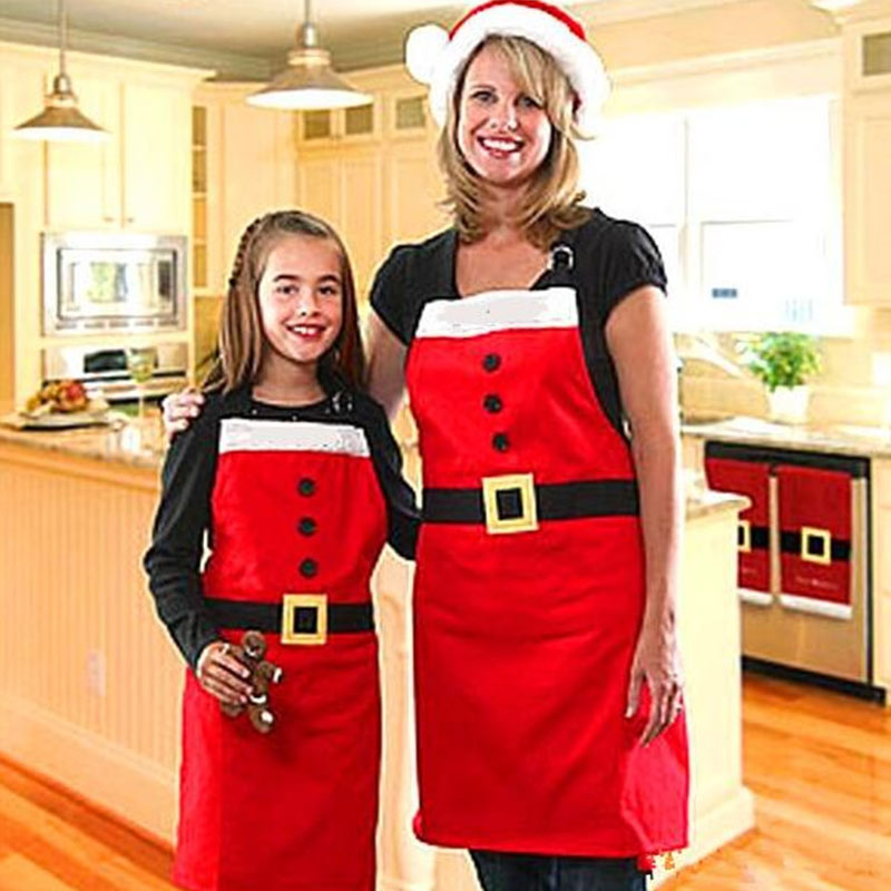 Tablier de style Père Noël pour les enfants et les ensembles de parents de maman pour Noël dans la cuisine