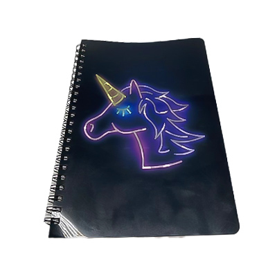 Carnet de notes à spirale avec licorne fluo sur la couverture